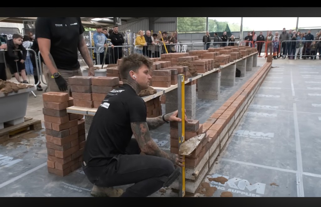 Wide view of the bricklaying challenge at Wembley
