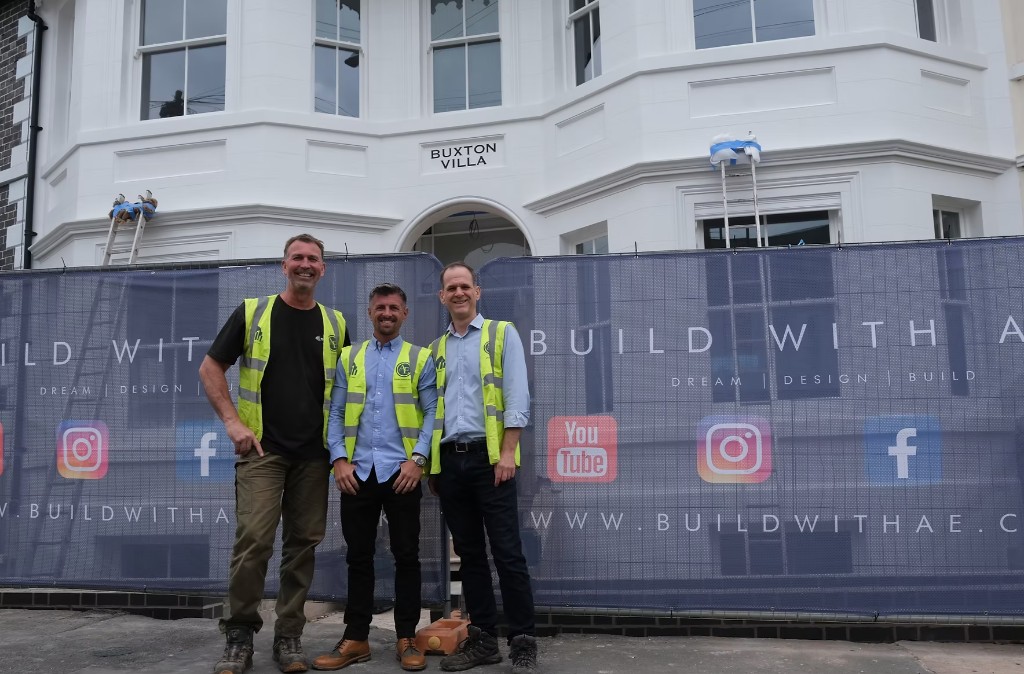 The team outside Buxton Villa at Church Hill